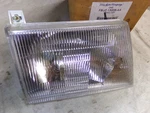 Headlamp Housing Assembly, Rh, 1997/2007 E150/350 Ford Econoline, Nos. Fixed Price $49.00.