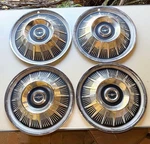 Set Of Ford Thunderbird Hub Caps 1964 Chrome Metal 15". Fixed Price $250.00.