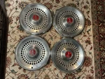 Set Of Four, 1977-78 Pontiac 15 Hubcaps #5046. Fixed Price $80.00.