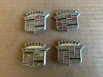 Cadillac 10661 Wheel Cover Center Emblem Oem Used Set. Fixed Price $29.99.