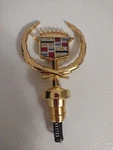 Vtg 1980-93 Cadillac Brougham Deville Fleetwood Gold Wreath Crest Hood Ornament. Fixed Price $125.00.