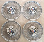 1963-1964 Ford Galaxie Wire Spoke Spinner Hubcap Set, Original 14" Wheel Covers. Fixed Price $495.00.