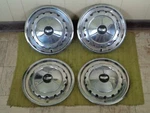 1957 Chevrolet 14" Set Of Chevy Wheel Covers. Fixed Price $159.95.