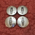 09-13 Lincoln Mks, Mkt, Mkx, Mkz Alloy Wheel Center Caps Set 8A53-1A096-AB Oem. Fixed Price $50.00.