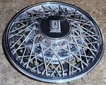 (1) Oem 1980-1985 Oldsmobile Toronado 15" Wire Spoke Hubcap Wheel Cover #0A. Fixed Price $54.99.