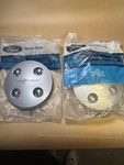 Nos 1983-86 Ford Thunderbird Polycast Center Caps E3SC-1A097-AB E5SZ-1130-B. Fixed Price $42.00.