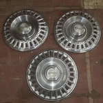 1967 68 Pontiac Hubcaps 14" Quantity 3. Fixed Price $50.00.