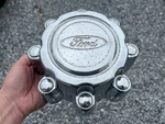 (1) Ford F-250 F-350 Oem Wheel Center Cap 1999-2004 F81A-1A096-BB F81A-1A096-CA. Fixed Price $18.95.