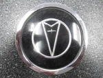 One (1) 1987 Pontiac Bonneville Wire Wheel Cover Center Cap Emblem 6736-C2 5091. Fixed Price $25.00.