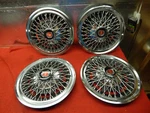 Used 74 75 Ford Gran Torino Elite 14" Wire Wheelcovers #D4OZ-1130-F. Fixed Price $249.99.