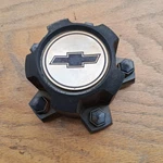 Chevy Blazer, S-10 Center Cap, Black, 1982-1993 Part # 14035565 01. Fixed Price $29.95.