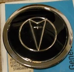 Nos 1987 Pontiac Bonneville 4 1/2" Center Cap. Fixed Price $45.00.