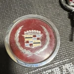 One 1981-1985 Cadillac Eldorado Seville 15" Wire Hubcap Center Gold Wreath. Fixed Price $45.00.