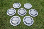 Set Of 7 1964 Ford Galaxie Hubcaps 10.5" Stainless Hipo Code Fairlane 15"WHL. Fixed Price $209.00.