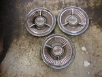 Three Oldsmobile Rim Wheel Cover. Fixed Price $85.00.