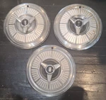 Set Of Three 1965 Plymouth Fury 14 Inch Spinner Hubcaps Wheel Covers. Fixed Price $80.00.