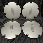 Lincoln Continental Center Caps Covers Set (4) 1998-2002 F80C-1A096-AB Silver. Fixed Price $139.99.