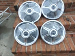 Set Of Four 1964 - 1966 Ford Mustang Wheel Covers 14". Fixed Price $135.00.
