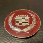 (1) 1986-1988 Cadillac Seville Eldorado Wire Wheel Emblem Silver Crest. Fixed Price $15.00.