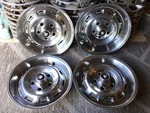 (4) 1980-87 Jaguar XJ6 15" Hubcaps Wheel Covers Stainless 10-SLOT 5-LUG #63501A. Fixed Price $199.00.