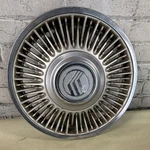 One 1987-1990 Mercury Sable # 859A 15" Spoke Design Hubcap Wheel Cover E74Y1130C. Fixed Price $35.00.