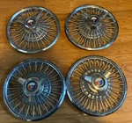 Ford Wire Spoke Spinner Hub Caps Set Of 1964 1/2 Mustang Galaxie Good Shape. Fixed Price $445.00.