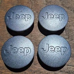 Jeep Grand Cherokee Compass Center Cap Set (4) 2006-2017, 5HT59TRMAB Repainted. Fixed Price $34.95.