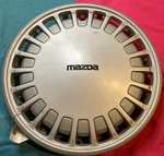 14" Wheel Cover 1988-1989 Mazda MX-6 Vintage Silver B45837170A Oe. Fixed Price $12.99.