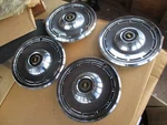 N.o.s.set Of (4) 1975 Dodge Coronet Hubcaps 3580409. Fixed Price $100.00.
