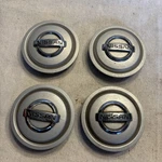 04 05 06 07 08 09 10 Nissan Armada Titan Alloy Wheel Center Caps 40342-7S500 Set. Fixed Price $39.95.