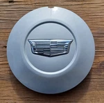 Genuine Cadillac Escalade Center Cap, 2015-2020 Part Number 23432319. Fixed Price $29.95.