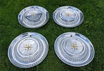 Set 1958 Desoto Firedome Fireflite Firesweep 14" Wheel Covers Hubcaps. Fixed Price $124.00.