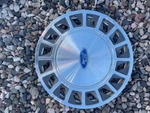 (1) Oem 1988-1994 Ford Aerostar Tempo 14" Hubcap Wheel Cover E89A-1130-DA. Fixed Price $27.99.