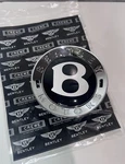Bentley Continental Series Genuine Black Center Cap W/ Chrome Ring # 3W0601159P. Fixed Price $65.00.