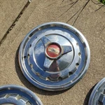 Video Set Vintage 1957 Chevy Belair Wheel Covers 14" Spinner. Fixed Price $250.00.