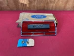 Nos 1974-1976 Ford Torino Elite Rear Fuel Door Emblem Reflector D5OZ-6540513-A. Fixed Price $225.00.