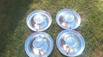Four Plymouth Cambridge Belvedere 15 Inch Hubcaps Wheel Covers. Fixed Price $95.00.