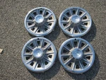 Factory Original 1965 Pontiac Tempest 14 Inch Hubcaps Wheel Covers. Fixed Price $44.00.