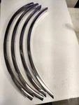 1965 Oldsmobile Starfire Dramatic All 4 Wheel Well Moldings ???. Fixed Price $99.99.